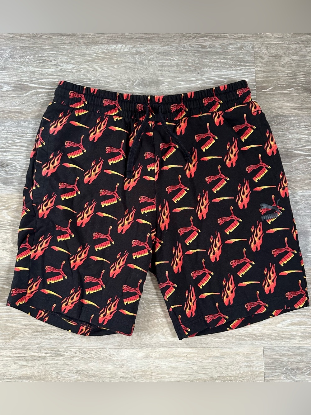 Boys black and flames puma shorts Sz M